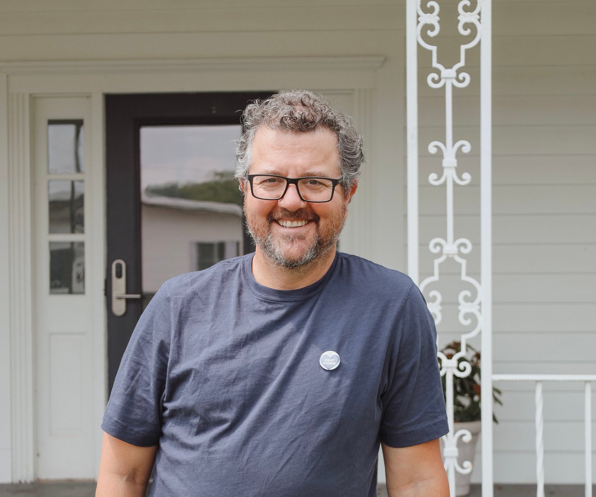 Panama Bartholomy standing on his porch